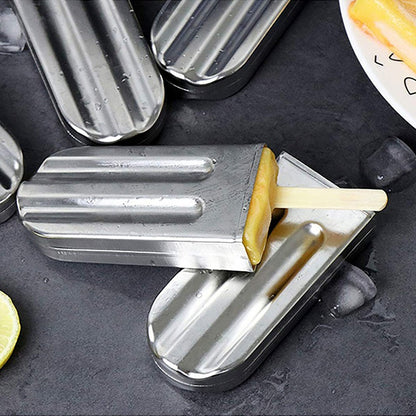 Close-up of an ice lolly being lifted out of a Frostia steel mould