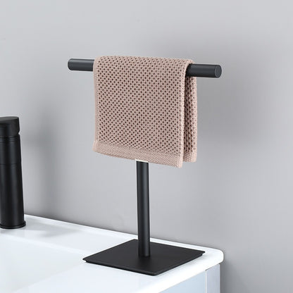 Havlin towel holder in matte black beside a basin with a hand towel