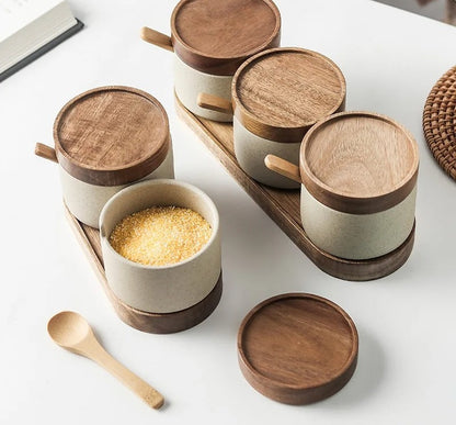 Sazuna ceramic spice jars with acacia lids and spoons on their tray