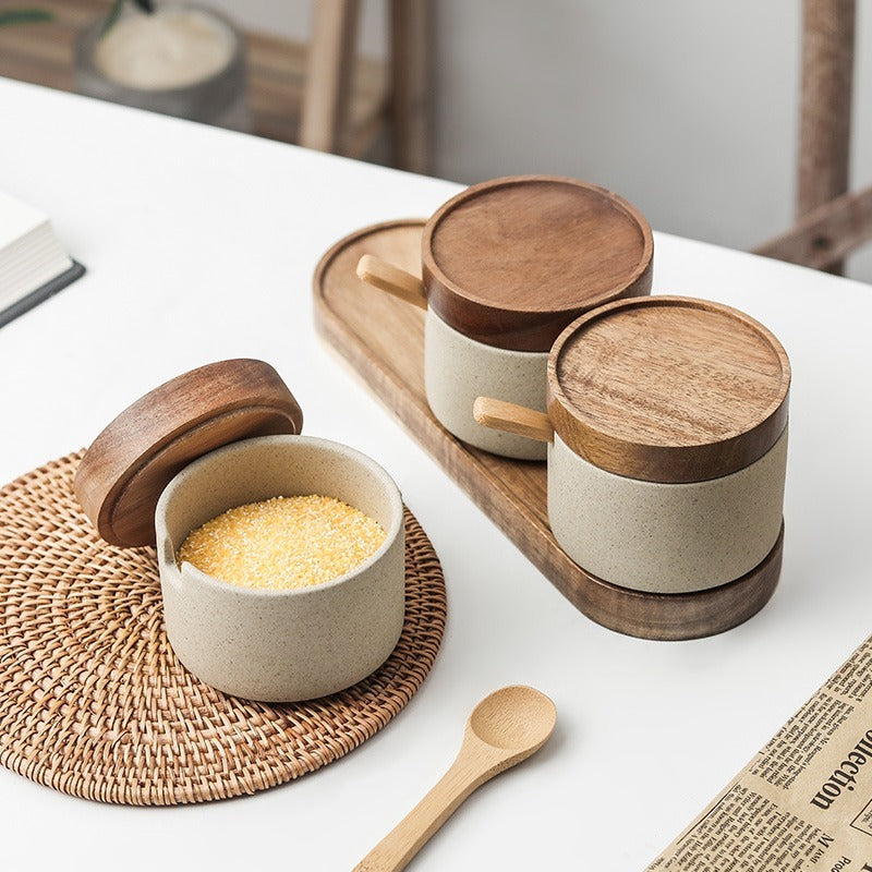 Sazuna jars on a kitchen counter with a wooden lid set aside