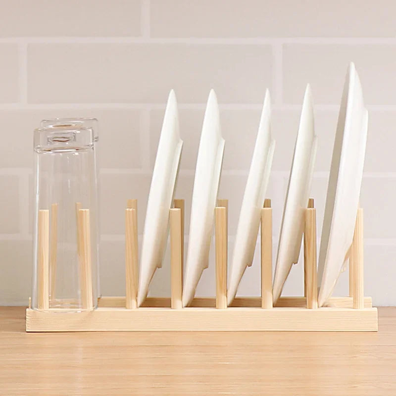 Dryva rack holding plates and a glass on a worktop