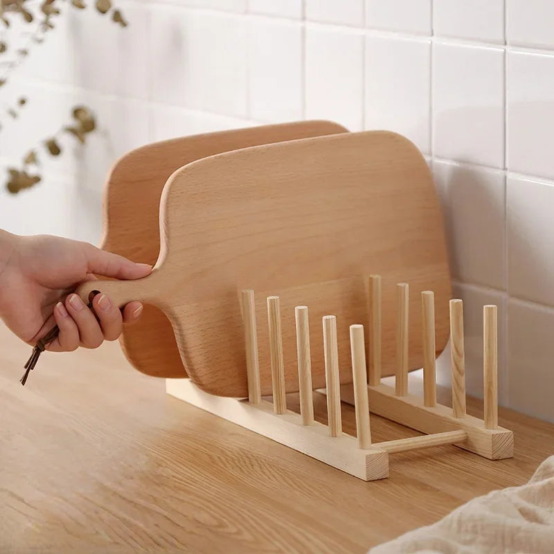 A chopping board being lifted from the Dryva rack