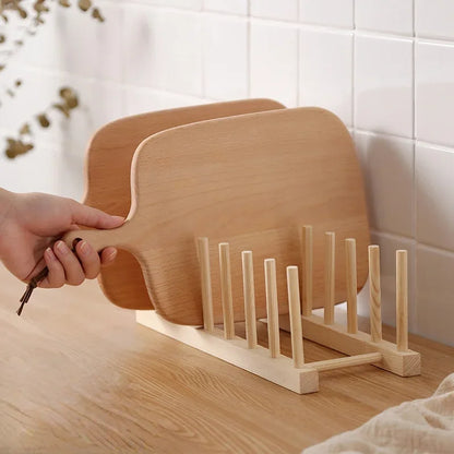 A chopping board being lifted from the Dryva rack