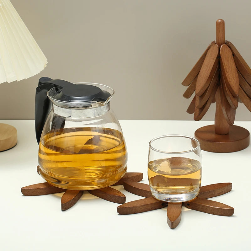 Pinora folding wooden trivet tree in walnut tone - coaster in use under a teapot