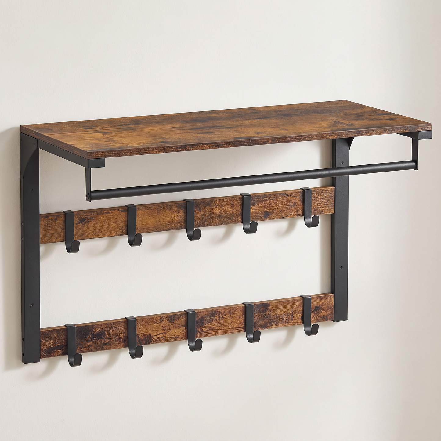 Arvid industrial wall coat rack with shelf mounted on a wall, three-quarter view