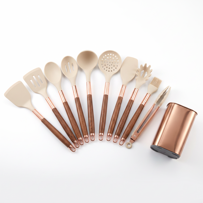 The Silixa utensil set in cream with wood-grain handles and its rose gold holder