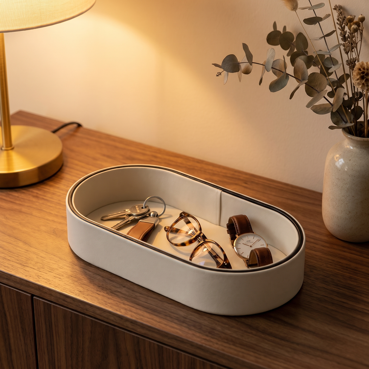 Valera valet tray on a walnut console with keys, glasses and a watch