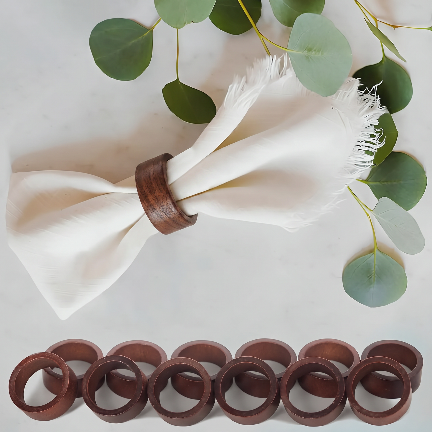Servera wooden napkin rings - linen napkin gathered through a ring, flat lay