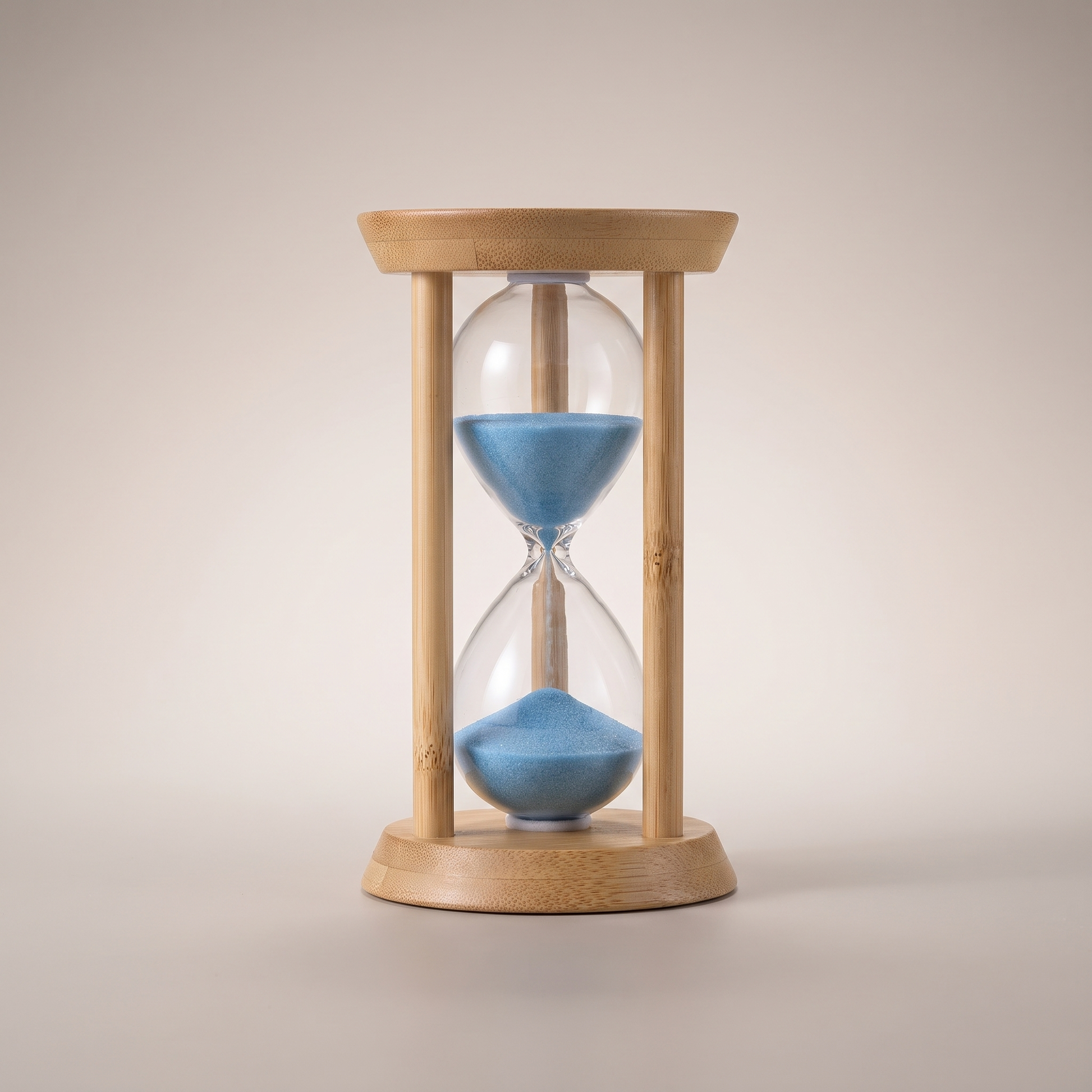 Zandra bamboo sand timer - studio packshot on neutral grey